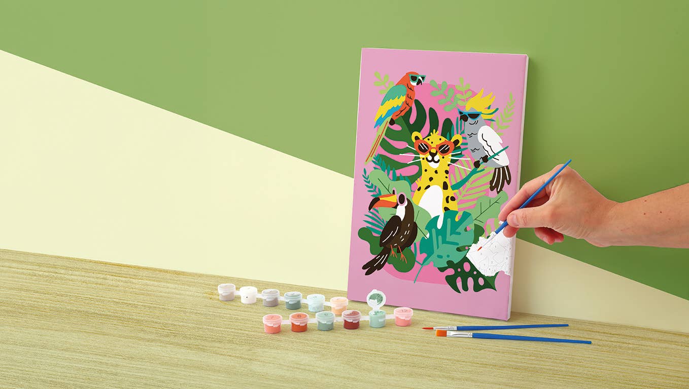 Child painting tropical paint by numbers canvas