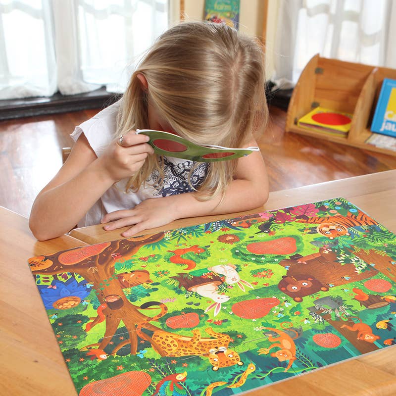Child completing Forest Detective puzzle