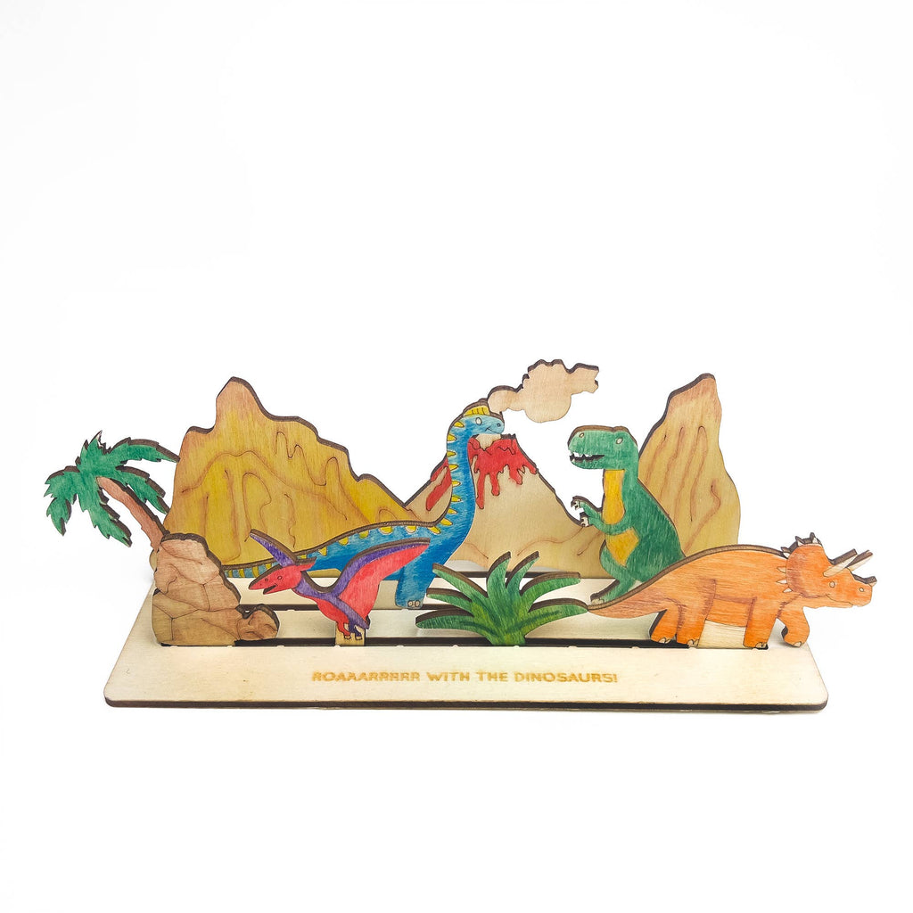 Painted wooden dinosaur scene on display stand