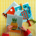 Kids embroidery kit with pineapple, fish, and boot templates