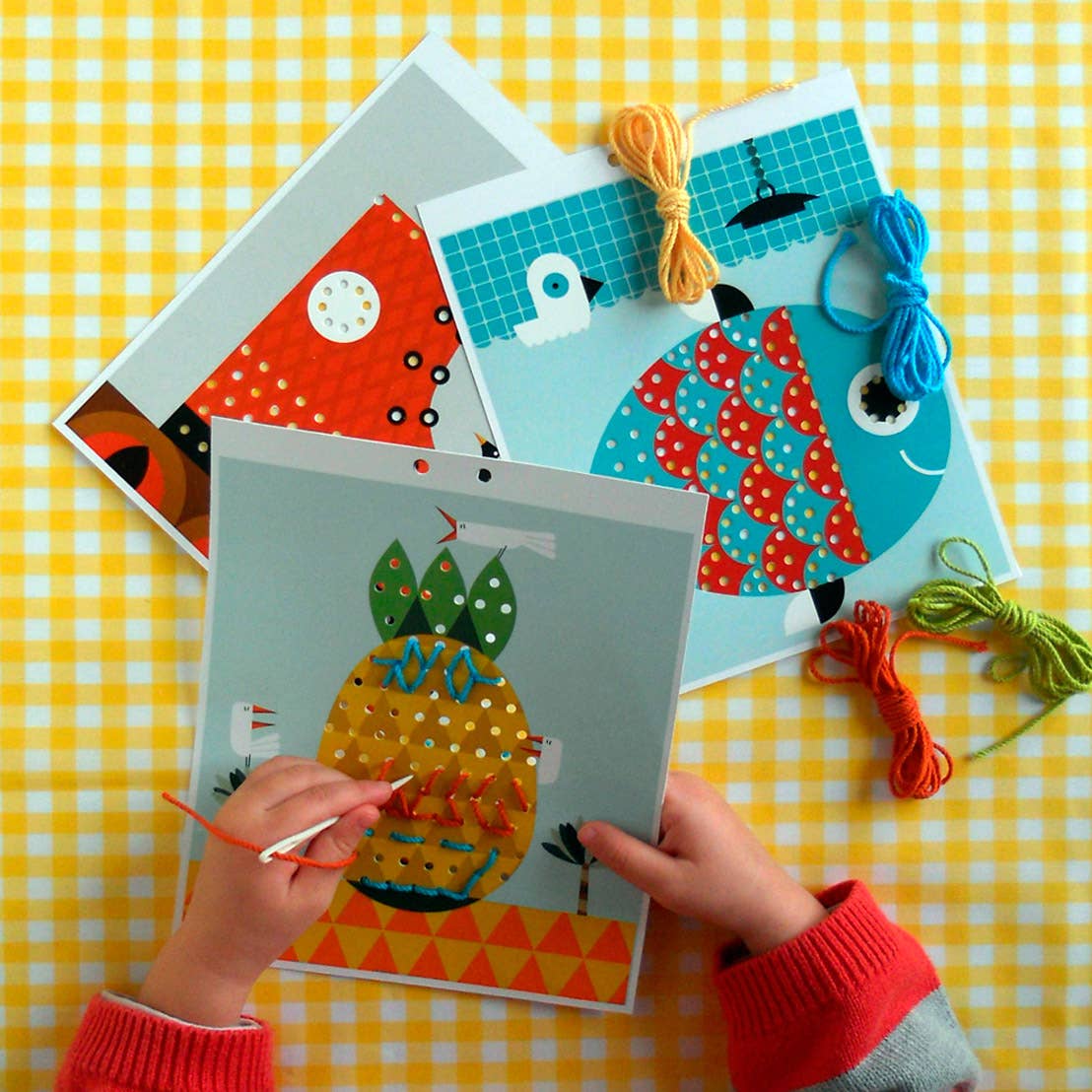 Kids embroidery kit with pineapple, fish, and boot templates